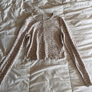 Coquette long sleeve, slightly cropped, waist synching, medium